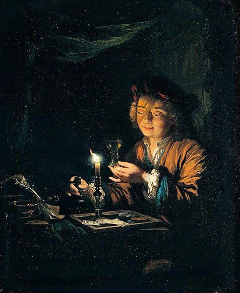 A Young Man Seated at a Table
